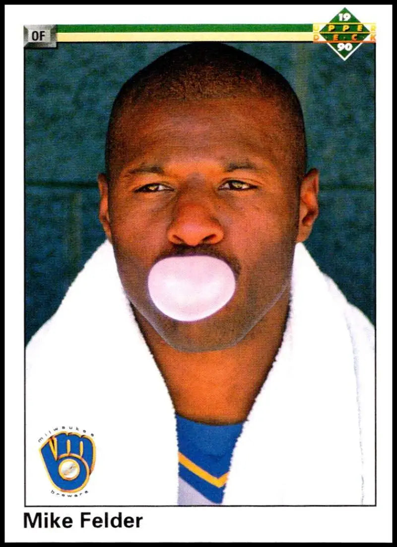 Milwaukee Brewers player Mike Felder blowing a pink bubble in Upper Deck card