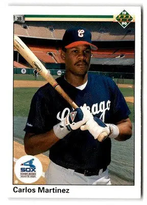 Baseball trading card of Carlos Martinez in dark blue uniform from 1990 Upper Deck