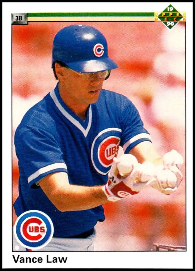 Vance Law in blue Chicago Cubs uniform holding a baseball from Upper Deck card