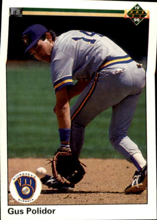 Baseball player Gus Polidor in Milwaukee Brewers uniform fielding position