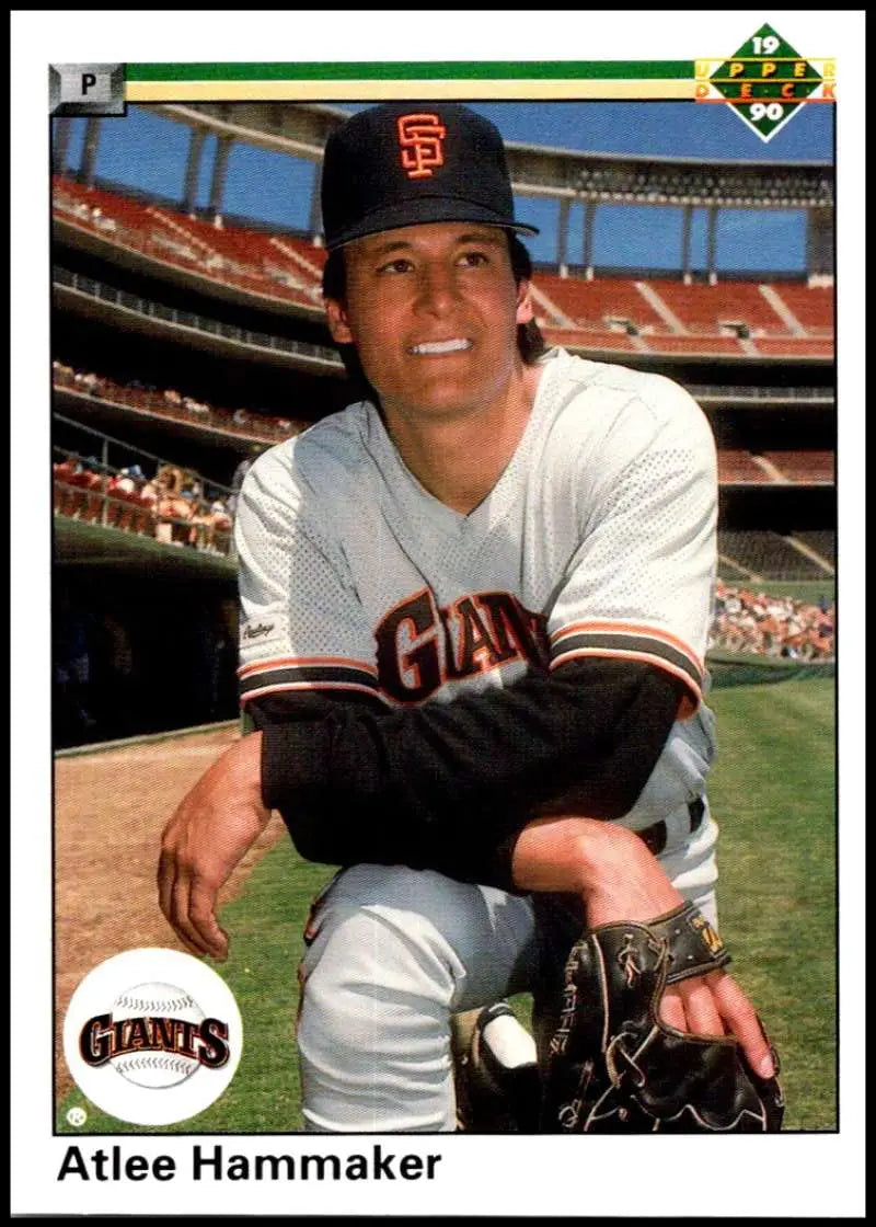 San Francisco Giants player Atlee Hammaker kneeling on the field in a white uniform