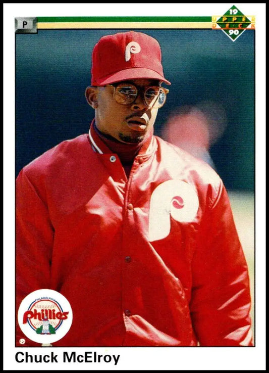 Chuck McElroy in red Phillies uniform with glasses on 1990 Rookie card