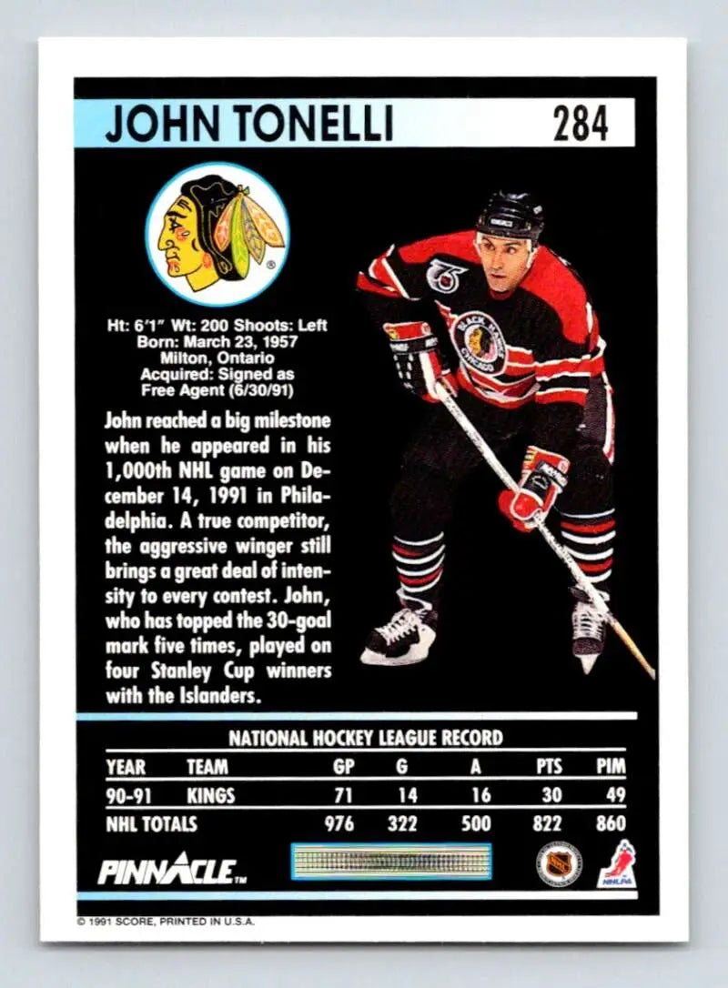 1991-92 Pinnacle John Tonelli Chicago Blackhawks hockey card in red and black uniform