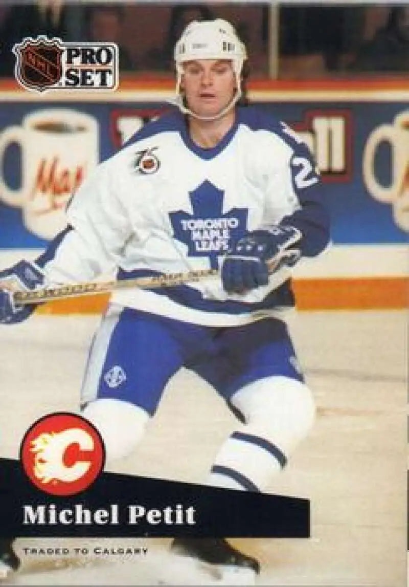 NHL Pro Set card of Michel Petit in Toronto Maple Leafs white and blue uniform