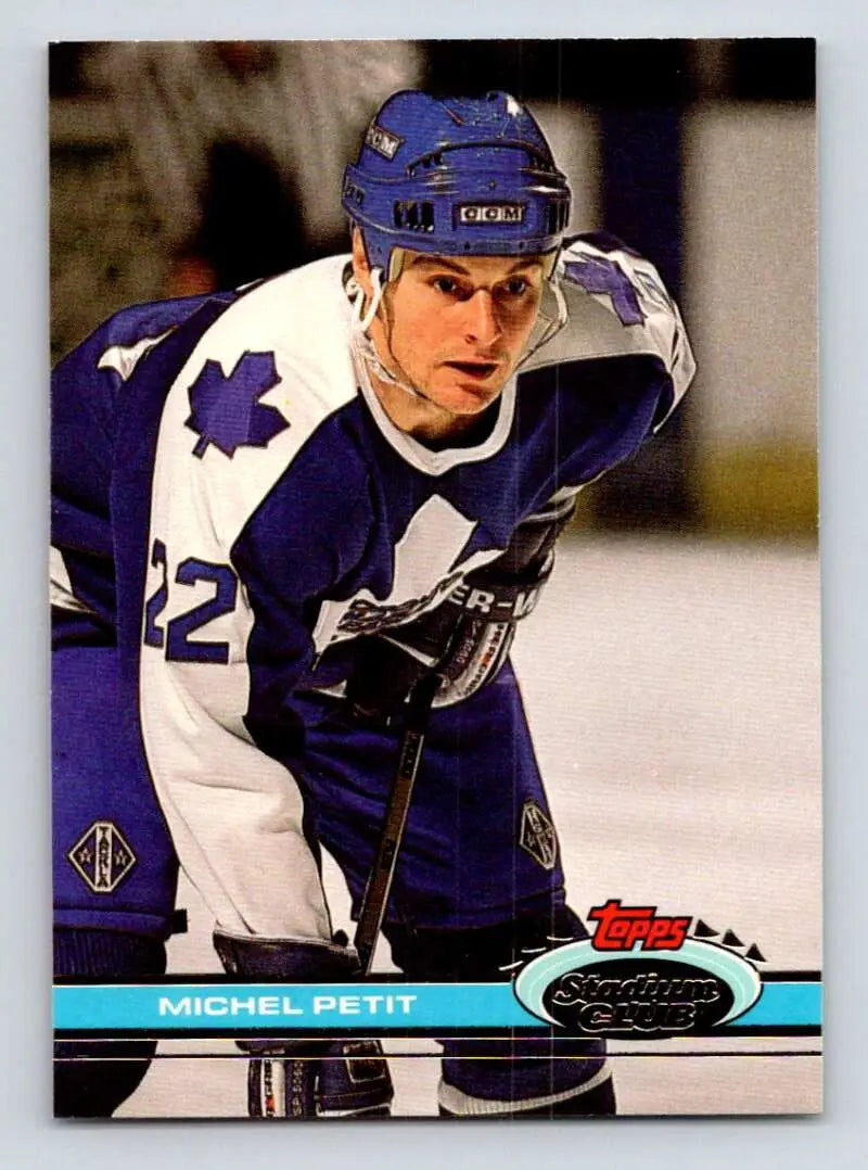 Hockey player in Toronto Maple Leafs jersey 42, featuring Michel Petit on card #311