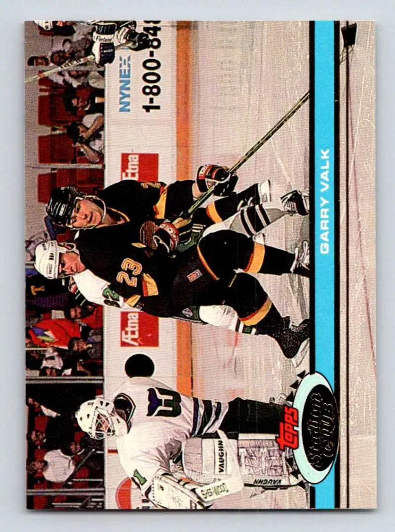 Hockey trading card featuring Vancouver Canucks players from Topps Stadium Club