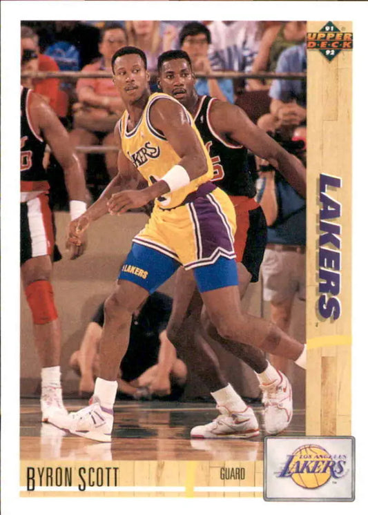 Basketball trading card featuring Byron Scott of the Los Angeles Lakers dribbling