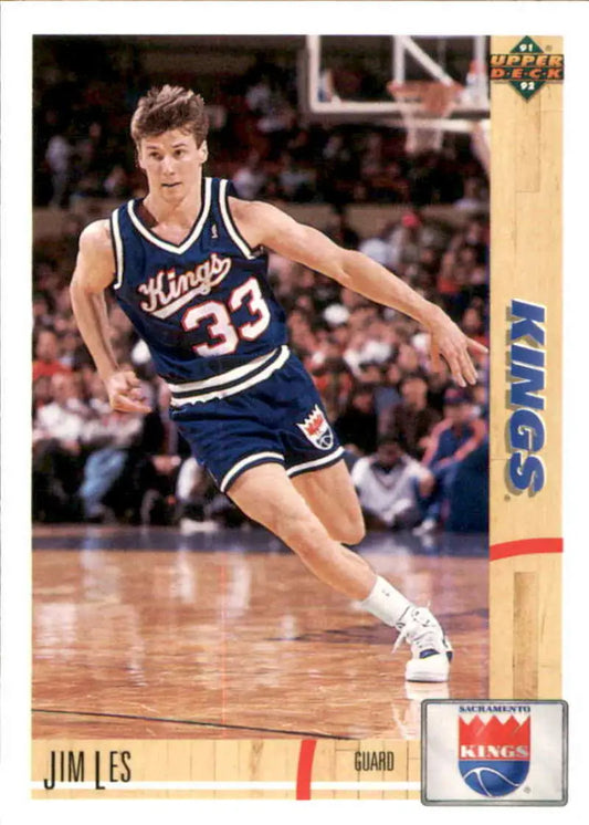 Basketball player in Sacramento Kings uniform #23 dribbling for Jim Les rookie card