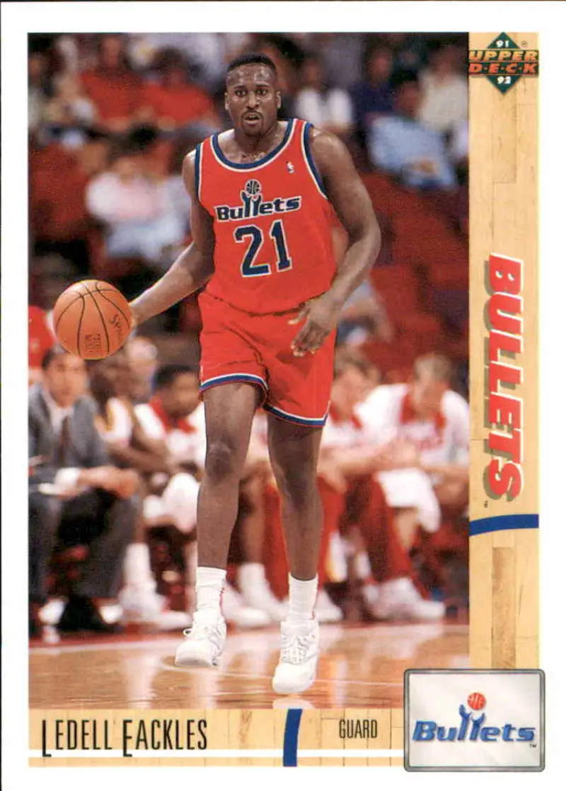 Basketball player in red Washington Bullets jersey dribbling ball on Ledell Eackles card