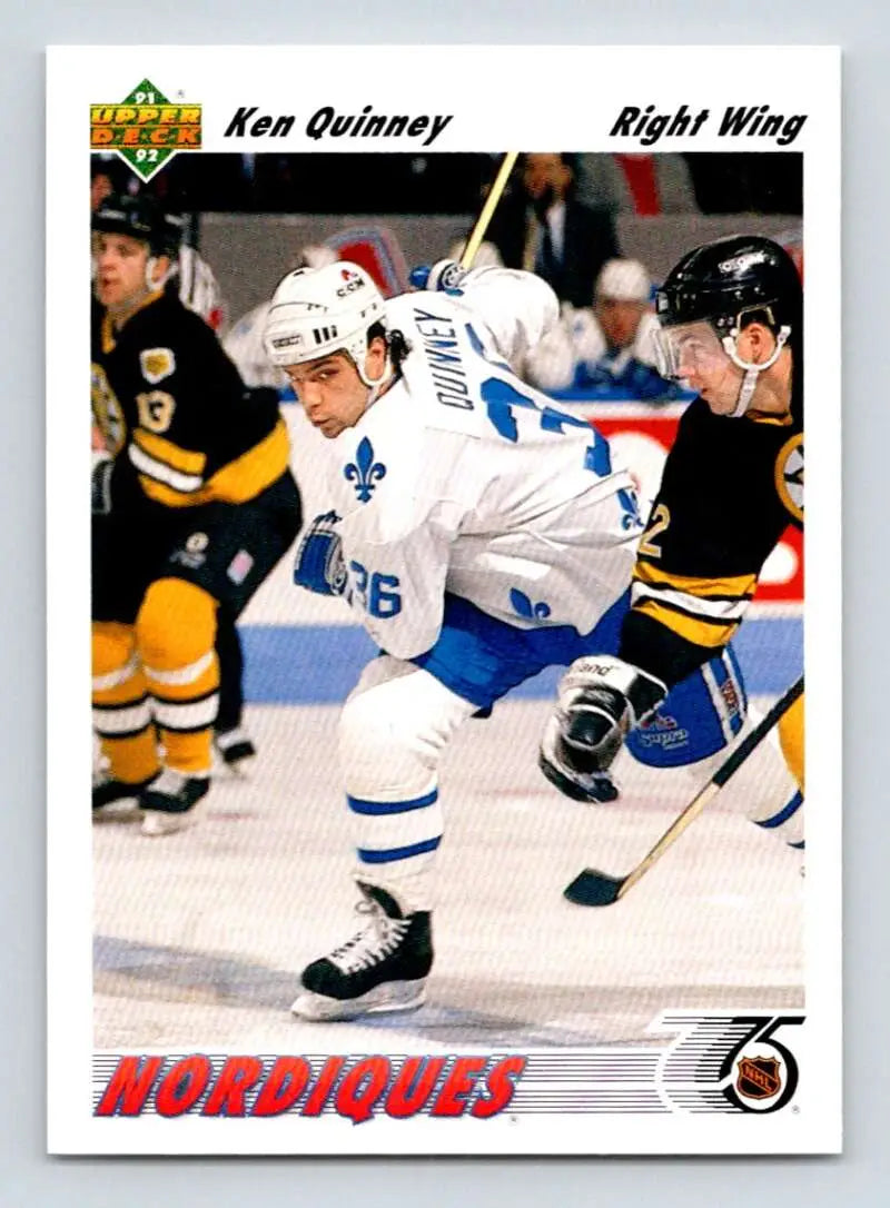 Hockey player Ken Quinney skating in white Quebec Nordiques jersey on Upper Deck card