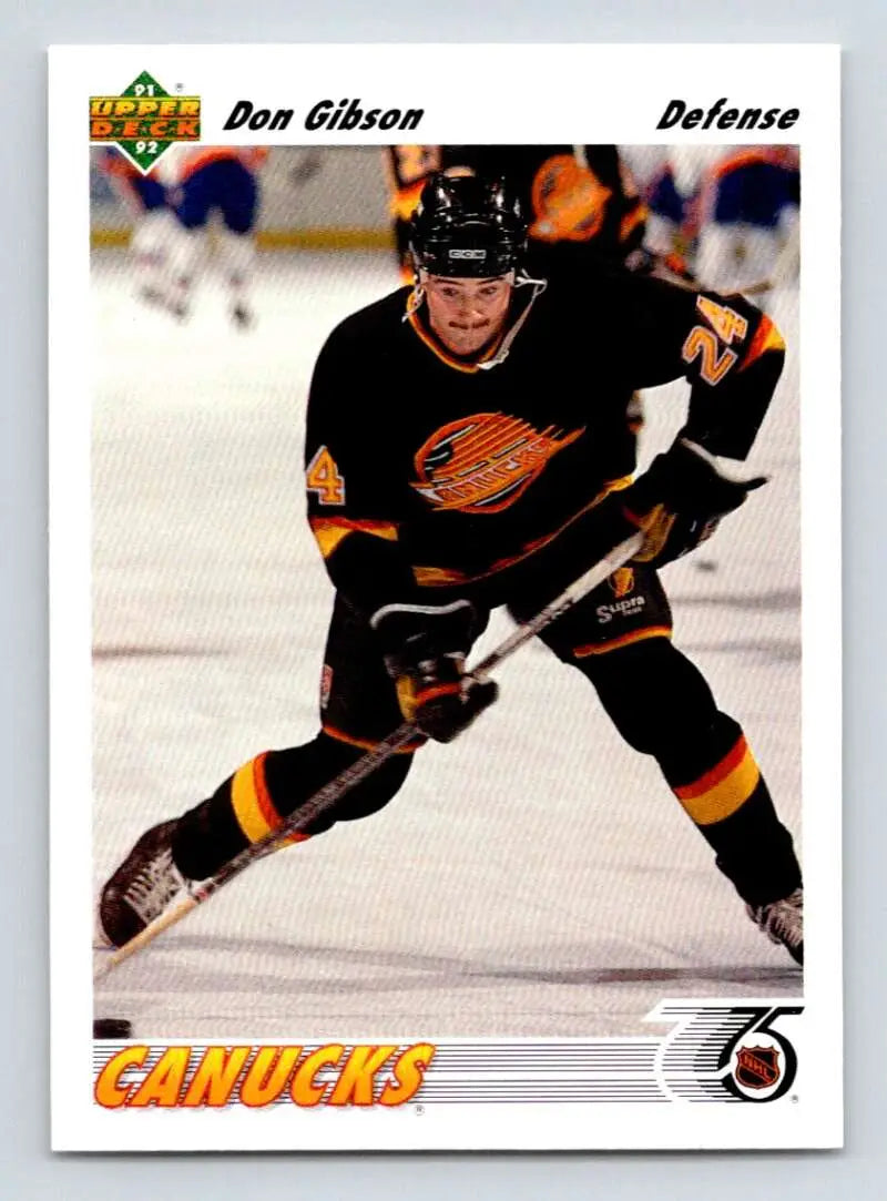 Hockey player in black and orange Vancouver Canucks jersey, 1991-92 Upper Deck card