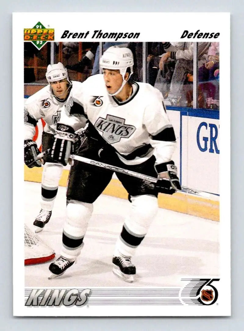 Hockey trading card of Brent Thompson in Los Angeles Kings white jersey during gameplay