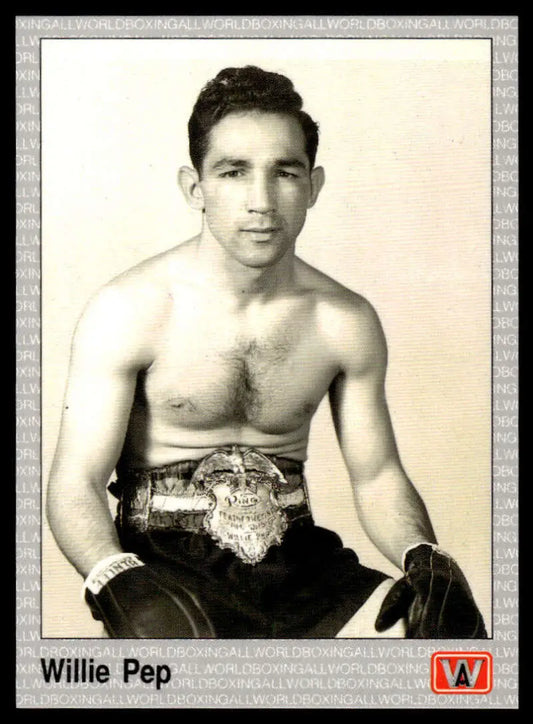 Vintage black and white boxing photograph of Willie Pep with championship belt in boxing card