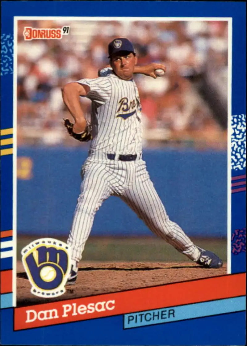Baseball card of Dan Plesac in pinstriped uniform for Milwaukee Brewers