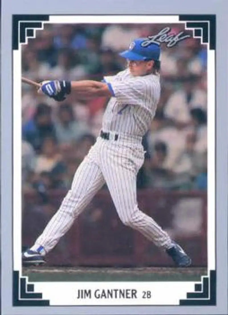Baseball card of Jim Gantner swinging in pinstriped uniform for Milwaukee Brewers