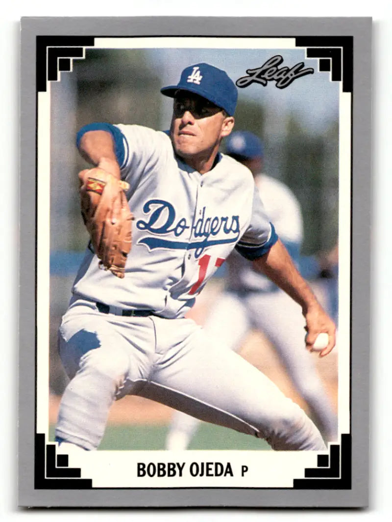 Bob Ojeda mid-throw in white uniform on 1991 Leaf #476 Los Angeles Dodgers baseball card