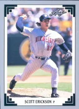 Baseball player in Minnesota Twins uniform throwing a pitch on Scott Erickson card