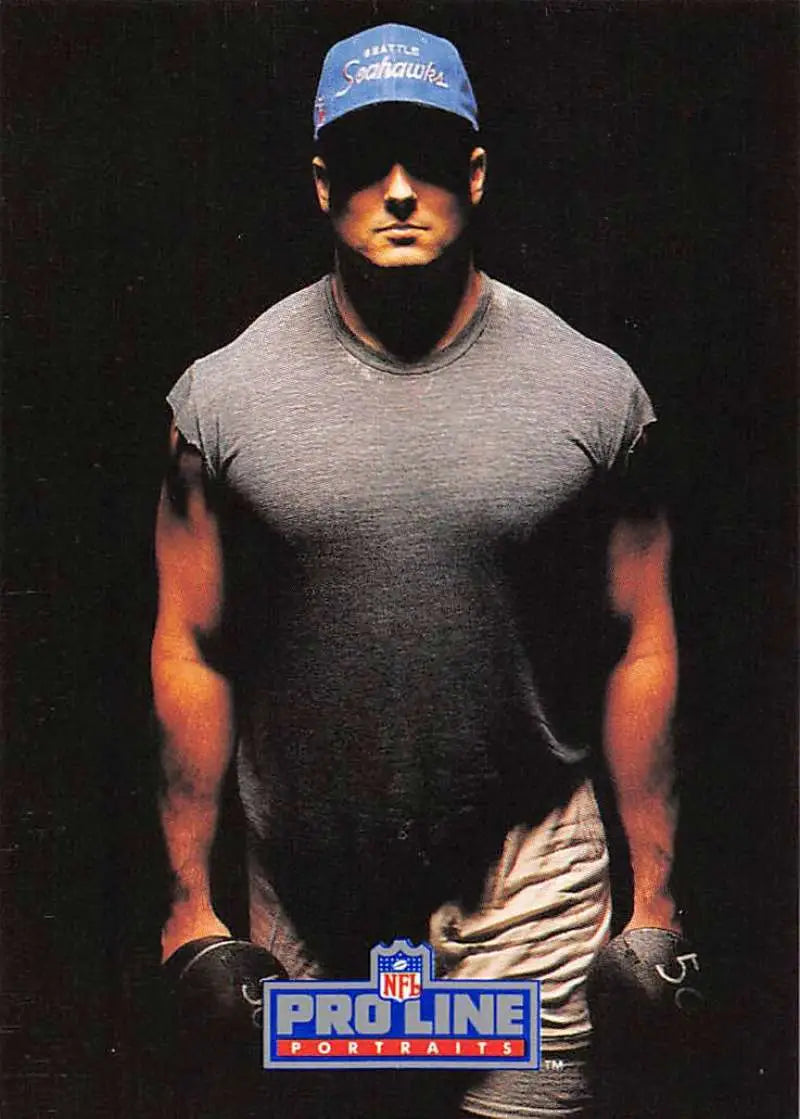 Athletic figure in gray t-shirt and khaki pants for Andy Heck Seattle Seahawks Pro Line Portraits