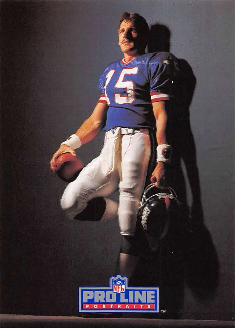 Jeff Hostetler in blue #15 jersey holding a helmet and football for New York Giants card