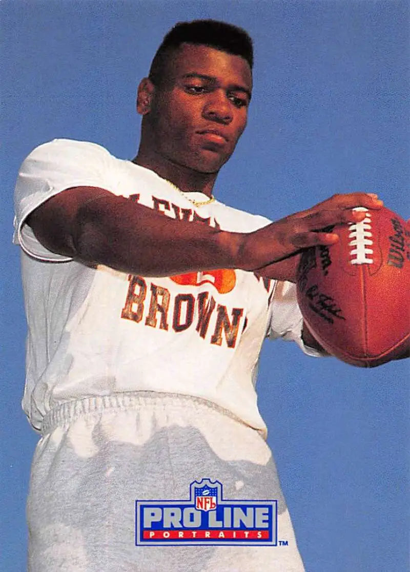 Cleveland Browns football card featuring Eric Turner holding a football in a white jersey
