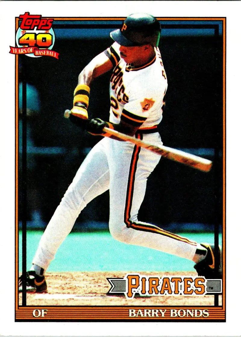 Baseball card of Barry Bonds swinging bat in white uniform for Pittsburgh Pirates