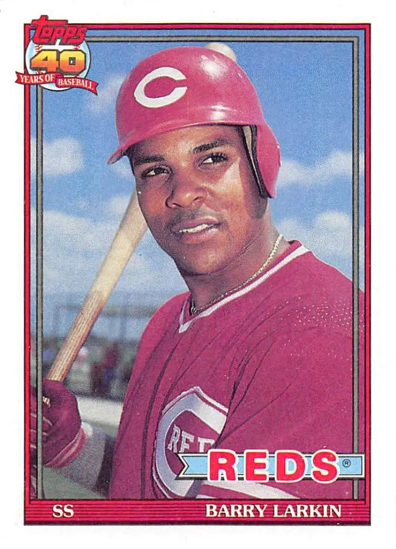 Baseball card of Barry Larkin in Cincinnati Reds jersey and red batting helmet