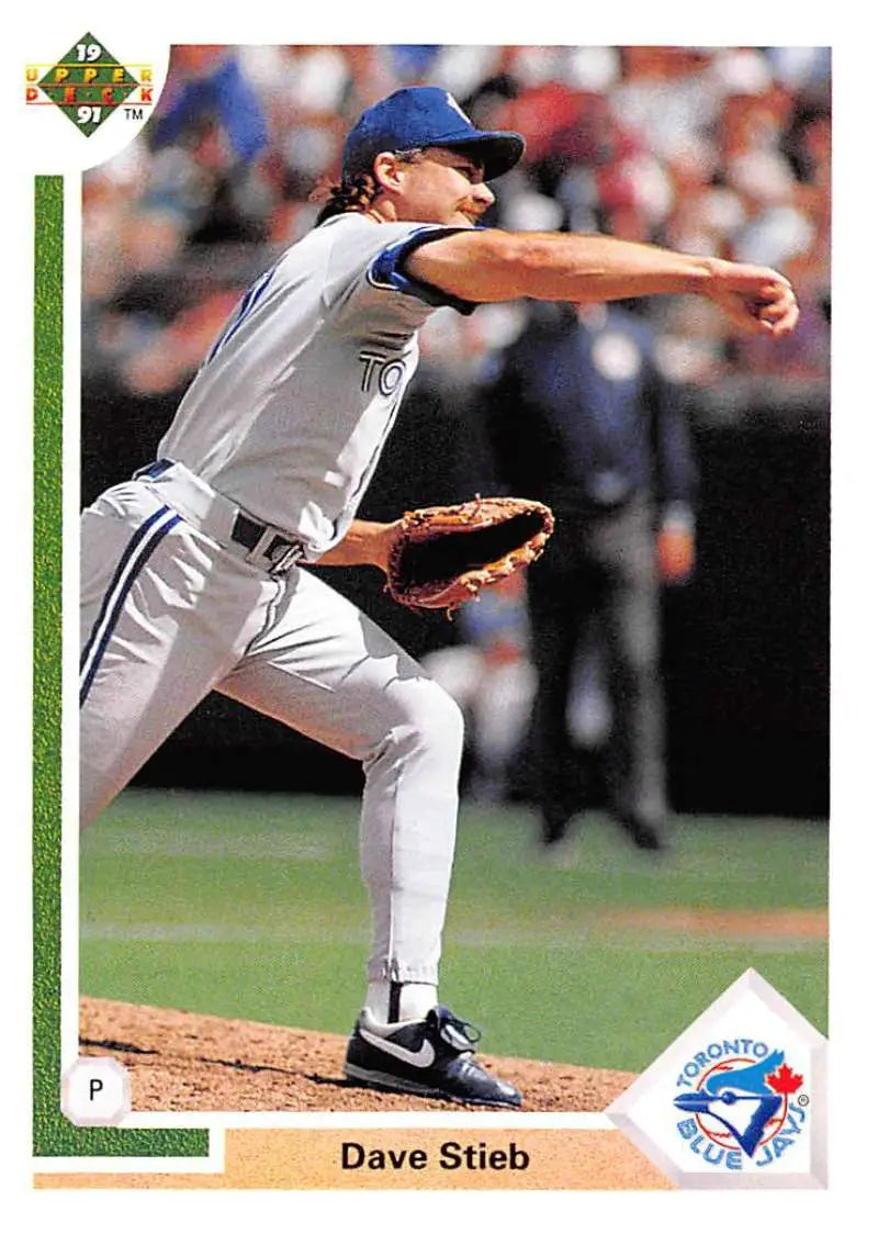 Toronto Blue Jays pitcher Dave Stieb mid-delivery in gray road uniform