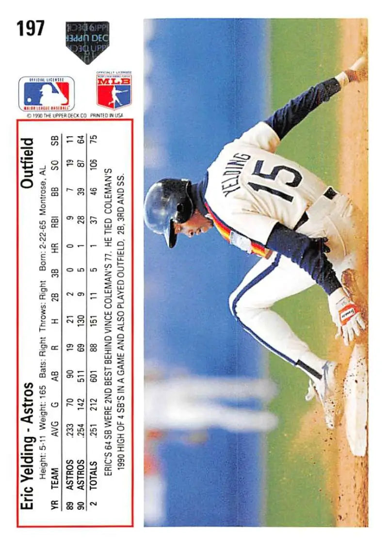 Baseball card of Eric Yelding sliding into a base in a white uniform, Upper Deck