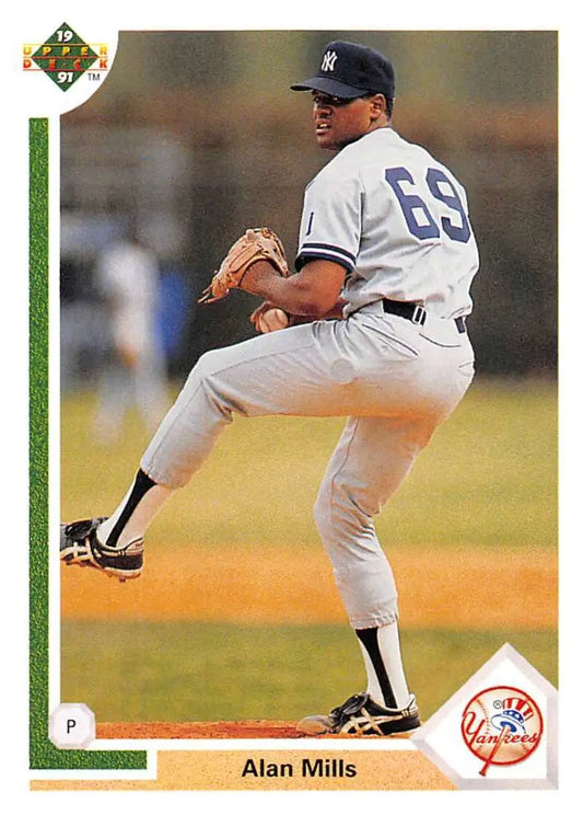 Baseball player Alan Mills in New York Yankees uniform pitching stance for card