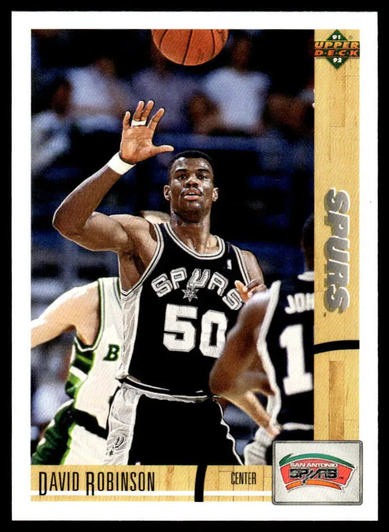 Basketball player in Spurs jersey with number 50, representing David Robinson
