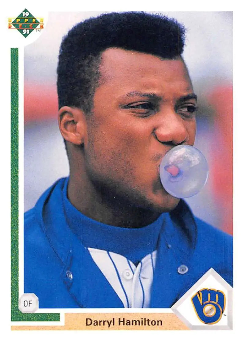 Baseball card of Darryl Hamilton in a blue Milwaukee Brewers uniform blowing bubble gum