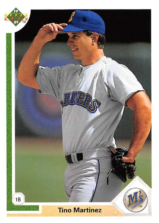 Tino Martinez in Seattle Mariners uniform adjusts cap on 1991 Upper Deck baseball card