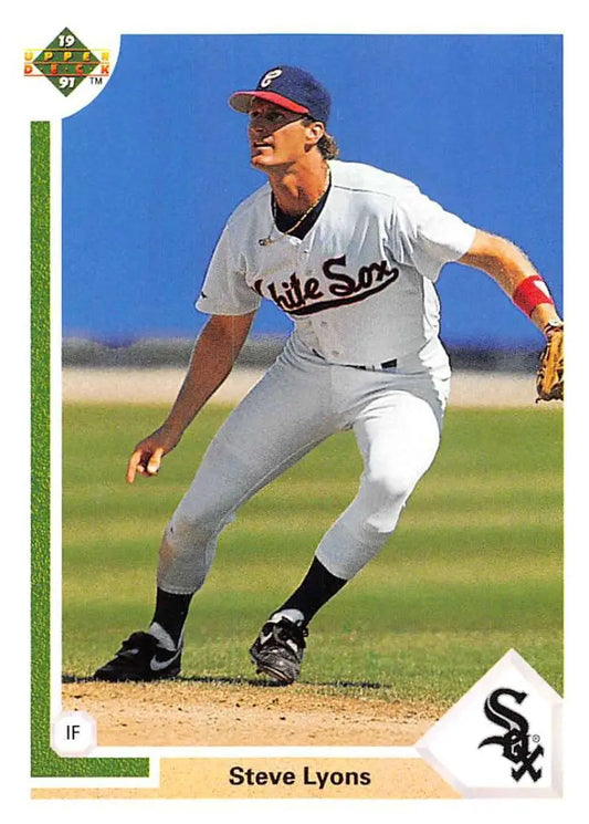 Baseball player in White Sox uniform in fielding stance on 1991 Steve Lyons card