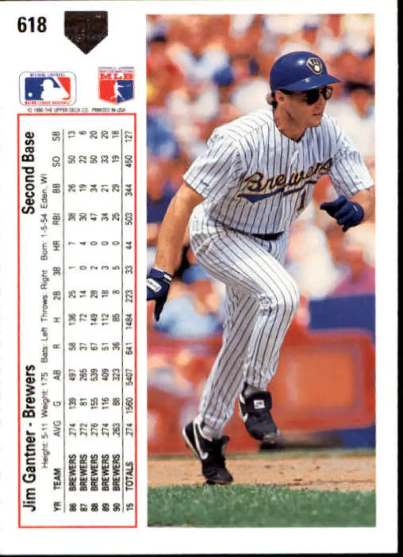 Baseball player Jim Gantner running in pinstriped Milwaukee Brewers uniform on field