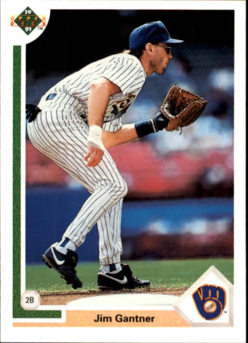 Jim Gantner in pinstriped uniform fielding for Milwaukee Brewers baseball card