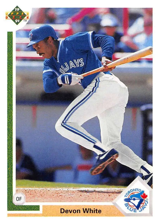 Devon White in batting stance, showcasing Toronto Blue Jays uniform in classic card