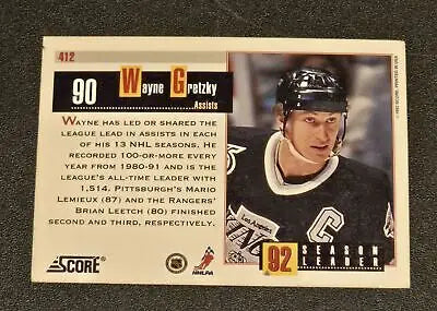 1992-93 Score Wayne Gretzky hockey trading card featuring face shot and team logo