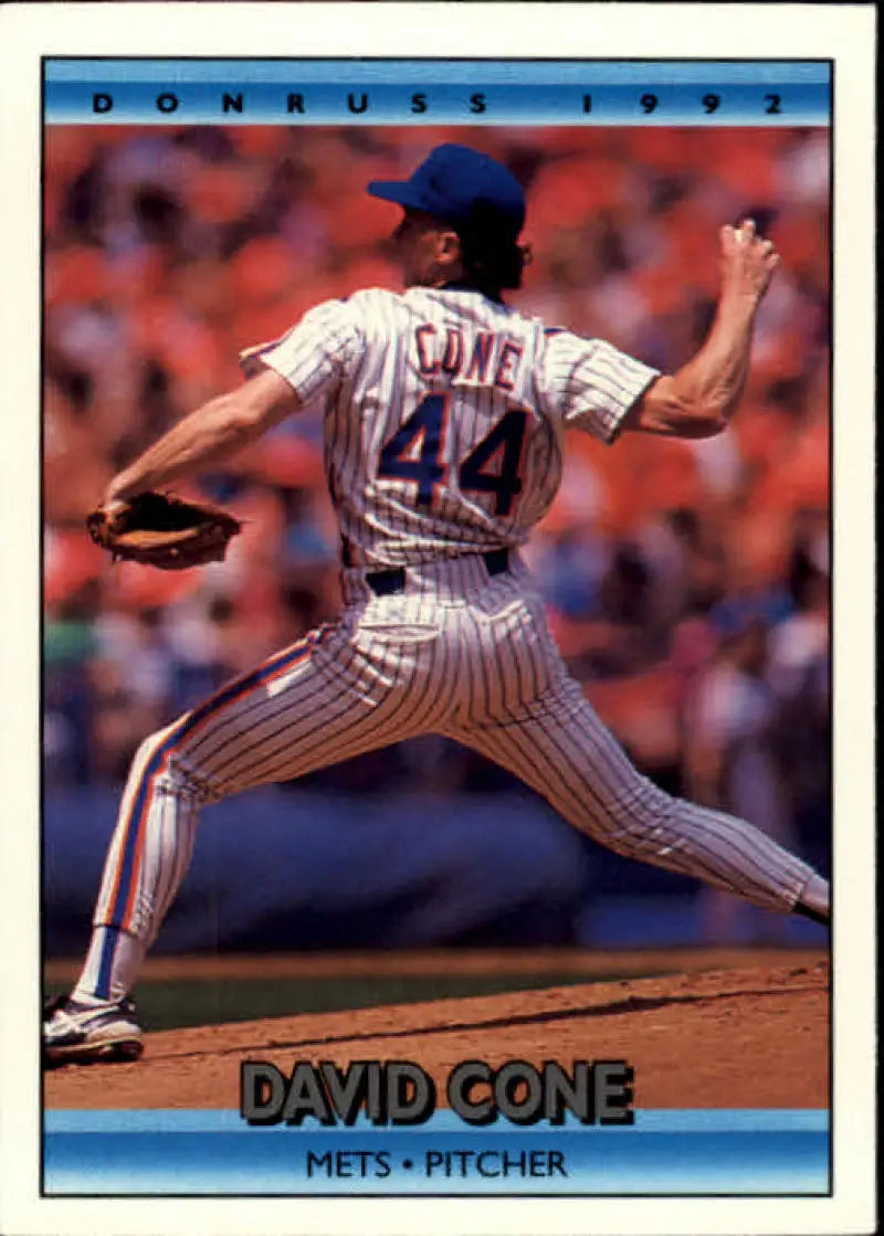 David Cone delivering a pitch in pinstriped New York Mets uniform on a baseball card