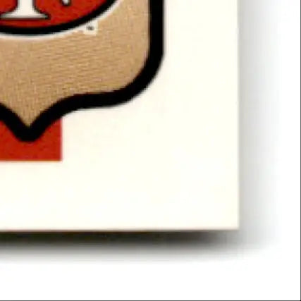 Beige and red shield-shaped emblem with black outline from Fleer Football Steve Young card
