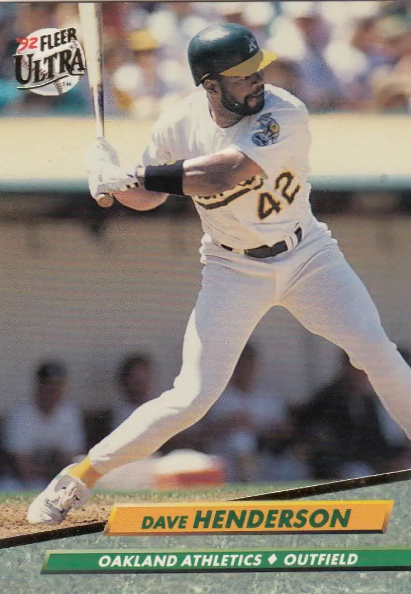 Baseball player in white Oakland Athletics uniform #42 in batting stance, Dave Henderson