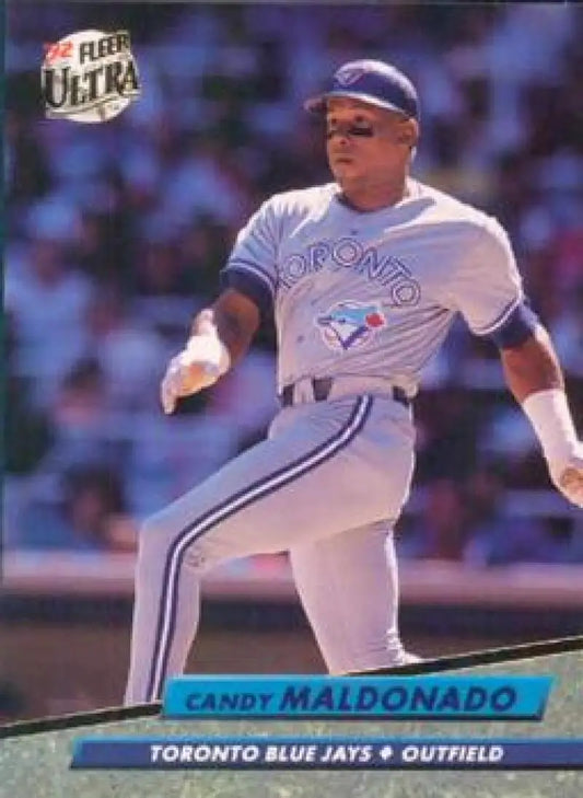 Candy Maldonado in a white uniform swinging on a 1992 Fleer Ultra baseball card