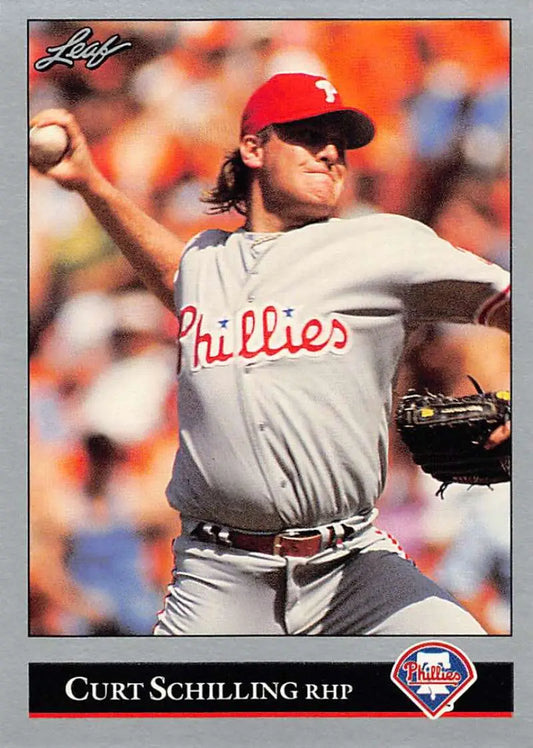 Baseball card of Curt Schilling pitching in gray uniform for Philadelphia Phillies