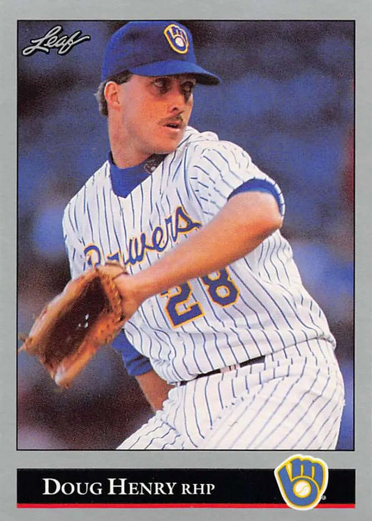 Doug Henry Milwaukee Brewers rookie baseball card in pinstriped uniform mid-delivery