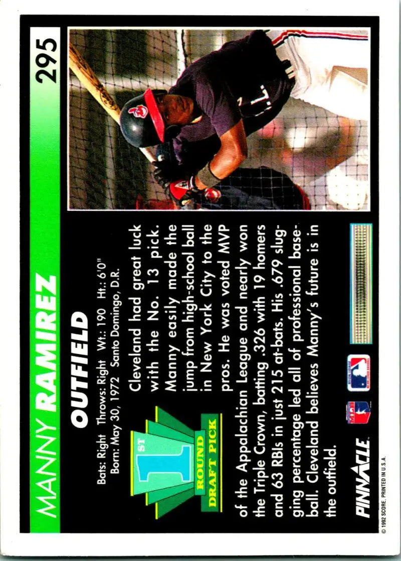 Baseball card of Manny Ramirez with catcher in dark uniform and red gear at home plate
