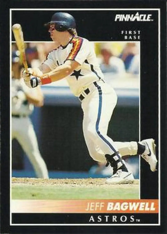 Jeff Bagwell batting in white uniform on 1992 Pinnacle Houston Astros baseball card
