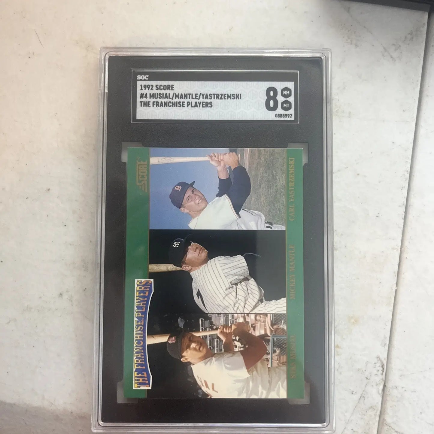 Graded 1992 Score trading card featuring Mickey Mantle, Stan Musial, and Carl Yastrzemski