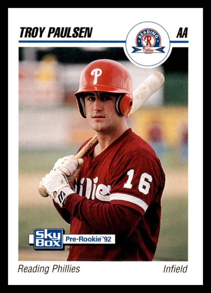 Baseball player in red Phillies uniform featuring Troy Paulsen on Reading Phillies card