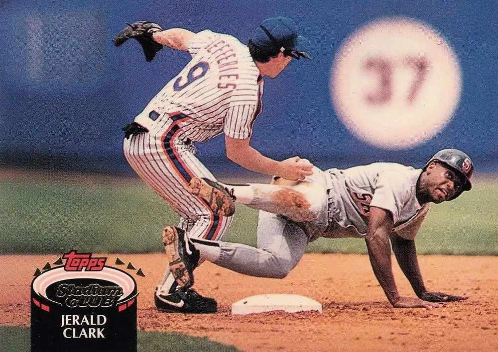 Action shot of a Mets infielder tagging baserunner in Jerald Clark San Diego Padres Baseball Card