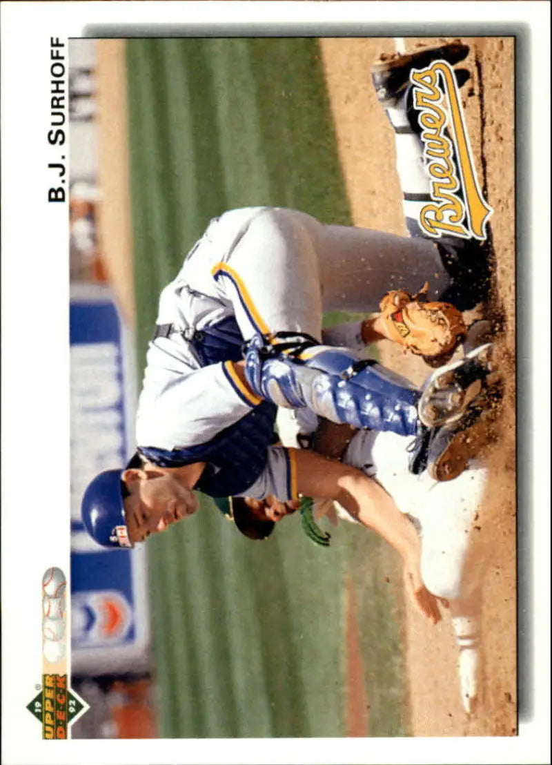 Baseball player sliding into home plate in a thrilling Milwaukee Brewers baseball card