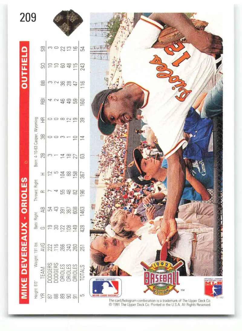 1992 Upper Deck #209 Mike Devereaux Baseball Card featuring Baltimore Orioles fans interaction